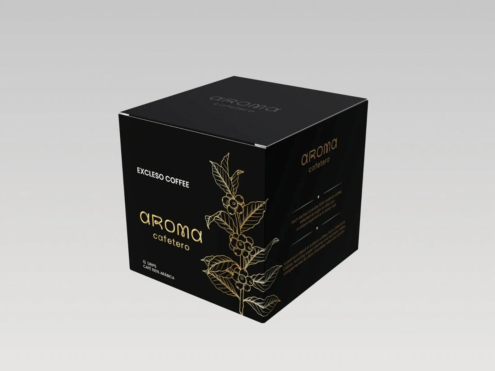 Caja negra de Aroma Cafetero con una rama de café dibujada en dorado y la palabra Excelso
